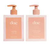 DAE Signature Duo Shampoo bottle emphasizes gentle cleansing with desert botanicals.