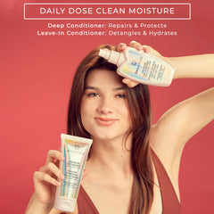 DAILY DOSE detangler application demonstrates smooth brushing and reduced breakage