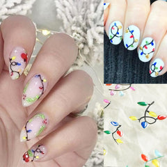 DAJIJIYOU arte navideño para uñas con luces coloridas, para looks festivos.