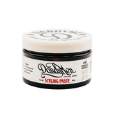 DandyMen styling paste bottle view shows versatile medium hold for all-day style.