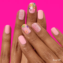 Dashing Diva Wallflower Frenzy close-up on nails with glossy finish.