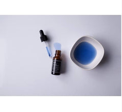 DearKlairs Midnight Blue serum texture close-up highlights a light, fast-absorbing feel.