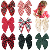 DEEKA dark green bow adds festive charm to toddler outfits.