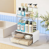 Delamu 2-drawer 2-tier bathroom organizer on counter showing organized cosmetics