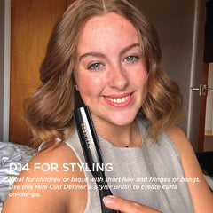 Denman D14 5-row brush used during dry hair styling for control