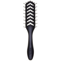 Denman D200 flexible vent brush in use for smooth detangling during styling.
