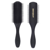 Denman D4 all-black brush close-up showing 9-row pins for gentle detangling