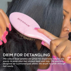 Denman D81M pink crush bristles closeup reveals boar and nylon blend for gentle detangling.