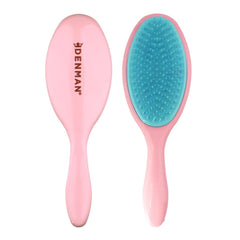 Denman Wet Detangler pink hairbrush closeup shows smooth detangling grip