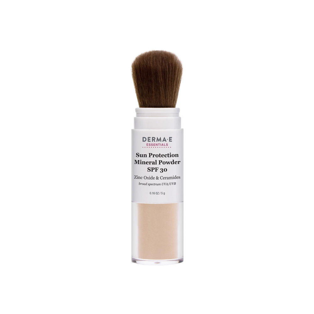 Derma E mineral sunscreen face brush-on applicator close-up showing matte finish and oil control.
