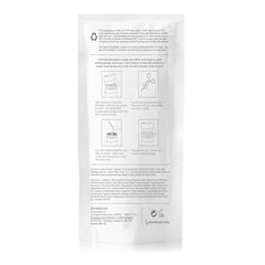 Dermalogica Daily Microfoliant powder in palm ready to activate into a creamy paste for exfoliation.
