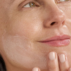 Dermalogica Super Rich Repair cream swirl shows thick, protective moisture for skin.