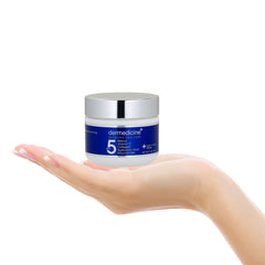 Dermedicine 5in1 jar closeup highlights luxurious formula for fine lines.