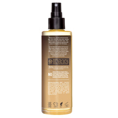 Desert Essence Body Oil Spray texture closeup reveals non-greasy silky skin feel