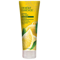 Desert Essence Lemon Tea Tree Shampoo bottle back highlights ingredients supporting scalp balance.