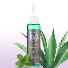 Design Essentials Peppermint & Aloe Scalp Tonic no-rinse bottle supports clean, balanced scalp.
