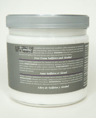 Design Essentials Rosemary & Mint conditioner texture close-up reveals creamy, deeply penetrating formula