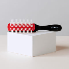 Diane Pro Mini Nylon Pin Styling Brush showing anti-static cushion for frizz control.