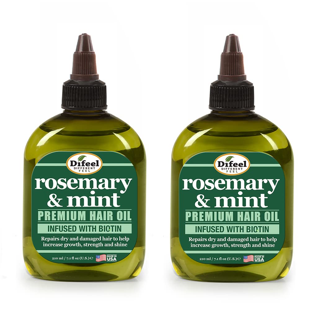 Difeel Rosemary Mint Hair Oil bottle pour shows premium packaging for easy daily use.