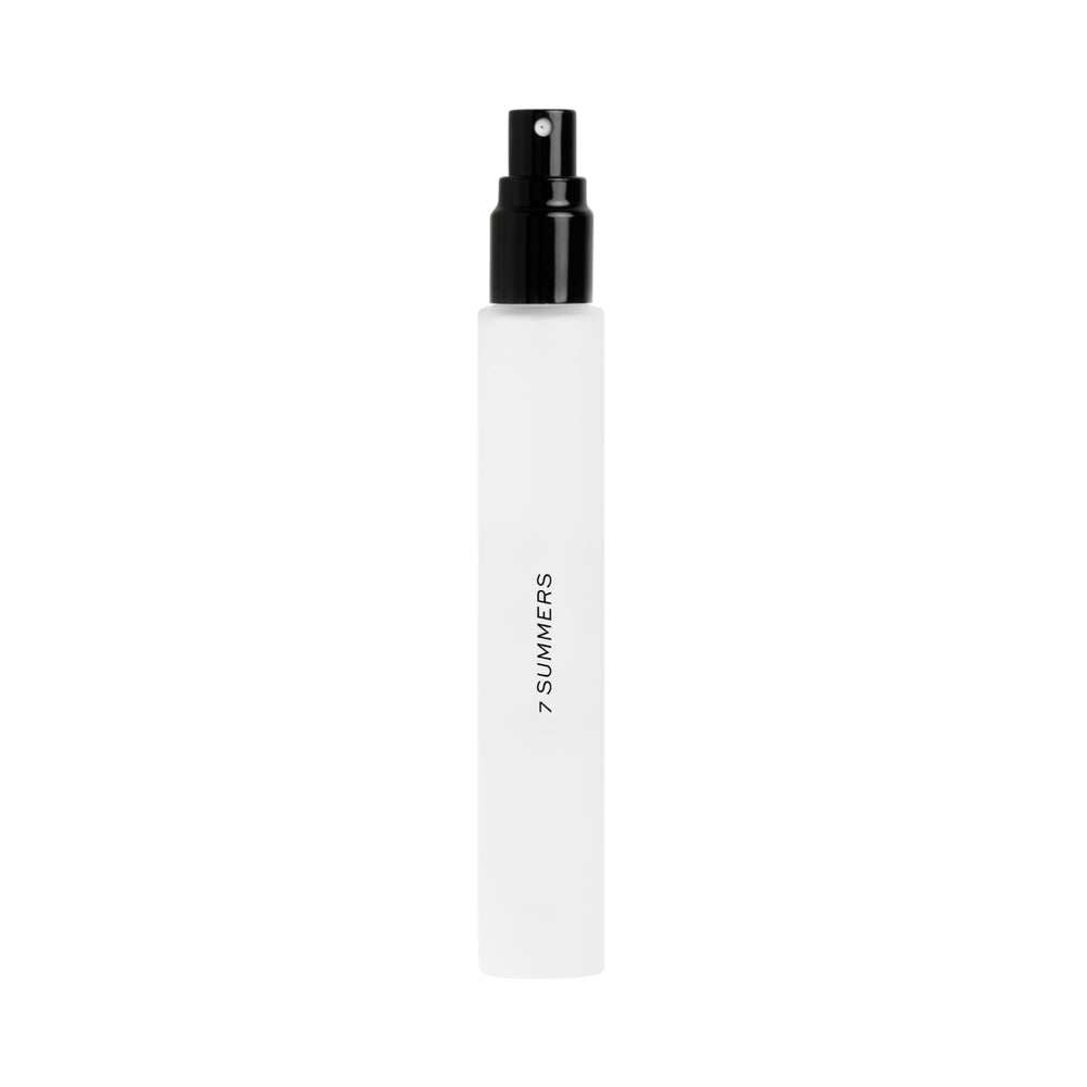 DIME Beauty 7 Summers travel spray cap open showcases portable freshness for on-the-go days.