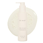 DIME Beauty Glaze bottle close-up demonstrating fast-absorbing hydrating oil.