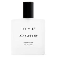 DIME Dans Les Bois bottle-front view for a bold, confident feminine fragrance.