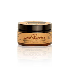 Dixon's 1737 leave-in conditioner bottle pouring for instant moisture