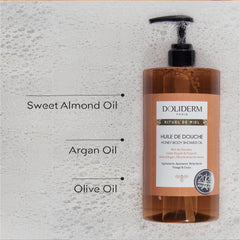 Doliderm Rituel de Miel honey drop on palm highlighting nourishing oils.