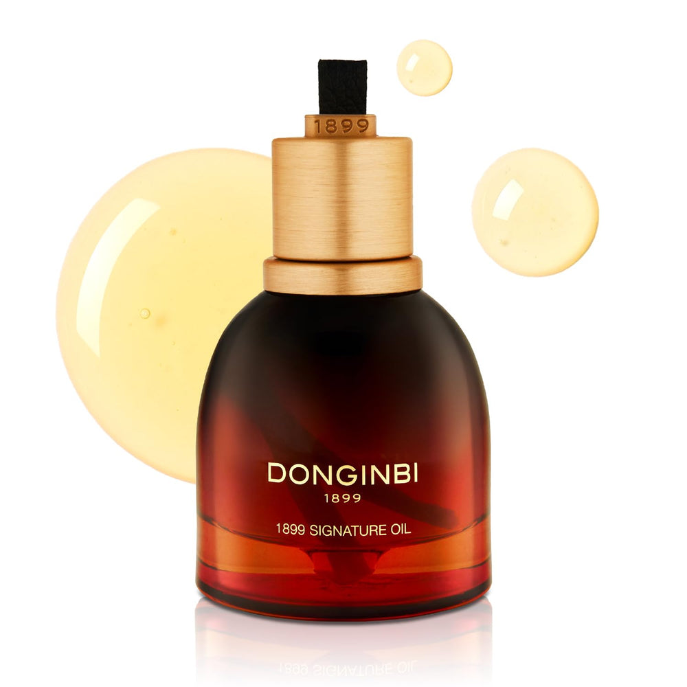 Donginbi 1899 Signature Oil bottle closeup reveals premium hydration.