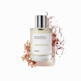 Dossier Ambery Saffron bottle front view signals premium, versatile wear