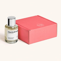 Dossier Fruits of Love top view highlighting elegant bottle design and fruity notes