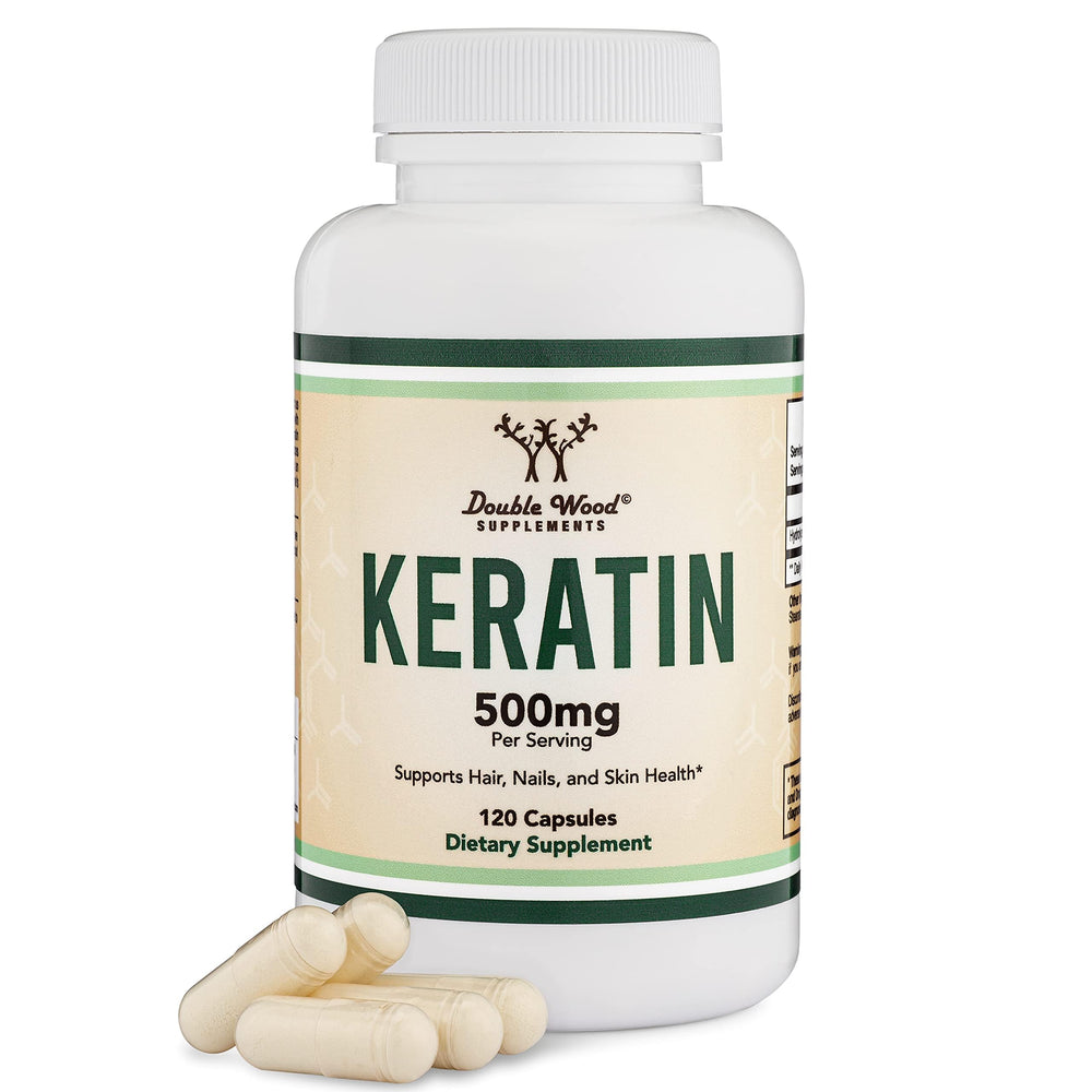 Double Wood Keratin Hair Growth Pills on a white surface highlighting hair-strength benefits.