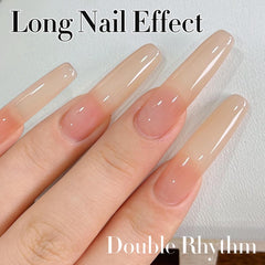 Double Rhythm hands applying gel polish under UV lamp for quick cure.
