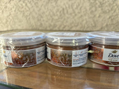 Dove Hot Cocoa Body Scrub image focuses on 3.5oz tubes for convenient at-home pampering