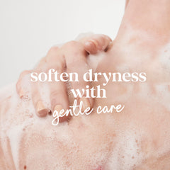Dove Sensitive Skin Body Wash bottle pour captures rich lather for soft, hydrated skin.