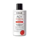 dpHUE ACV Revitalizing Shampoo bottle pouring for balanced scalp and fuller-looking hair.