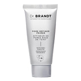 Dr. Brandt Pores No More bottle closeup highlighting pore refinement.
