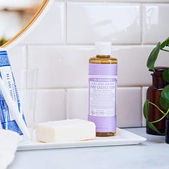 Dr. Bronner's bottle pour-spout demonstrates concentrated formula for economical dilution.