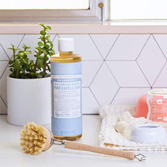 Dr. Bronner's Organic oils and fair trade label highlight ethical sourcing.