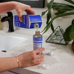 Dr. Bronner's peppermint liquid soap lather close-up in action for cleansing skin.