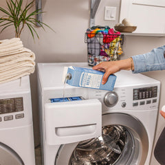 Dr. Bronner's Unscented Baby refill carton signaling gentle, all-purpose cleansing.