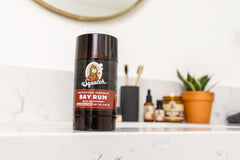Dr. Squatch Bay Rum natural ingredients panel highlights baking soda and arrowroot.