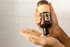 Dr. Squatch Cool Citrus Conditioner pour for easy application and lightweight hydration.