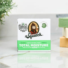 Dr. Squatch Total Moisture Bar Green Tea Butter slice shows rich lather and moisture.