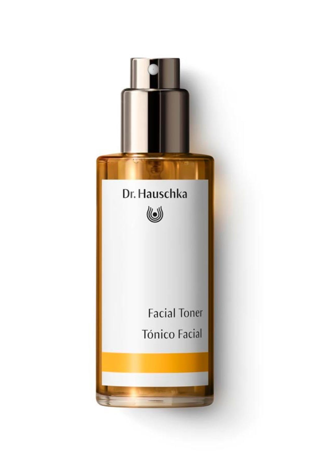 Dr Hauschka Facial Toner bottle pour shows a fine mist for refreshed skin.