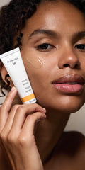 Dr. Hauschka Night Serum apple blossom extract detail—botanical balance during night routine.