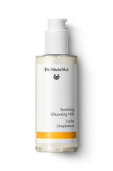 Dr. Hauschka soothing cleansing milk bottle on sink for gentle daily cleansing.