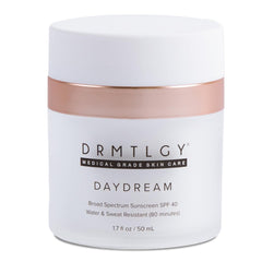 DRMTLGY Day Dream bottle closeup showing SPF 40 hydration for daily skincare.