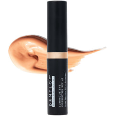 DRMTLGY Luminous Eye Corrector SPF 41 compact with peach undertone for brighter under-eye skin.