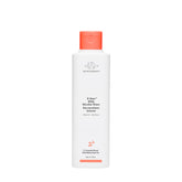Drunk Elephant E-Rase Milki Water bottle pour for gentle makeup removal and skin-nourishing cleansing.